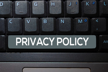 Privacy Policy write on keyboard isolated on laptop background