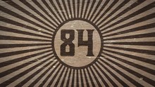 Number Eighty-four On Wooden Texture. Ideal For Your Numbers / Countdown / Aniversary Projects. High Quality Seamless Animation. 4K, 60fps 