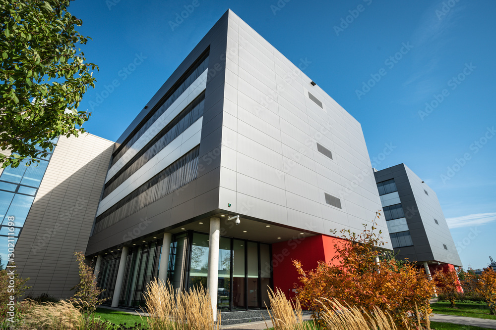 modern office building against a nice blue sky Stock Photo | Adobe Stock