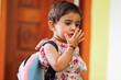 Cute Indian girl child with school bag 