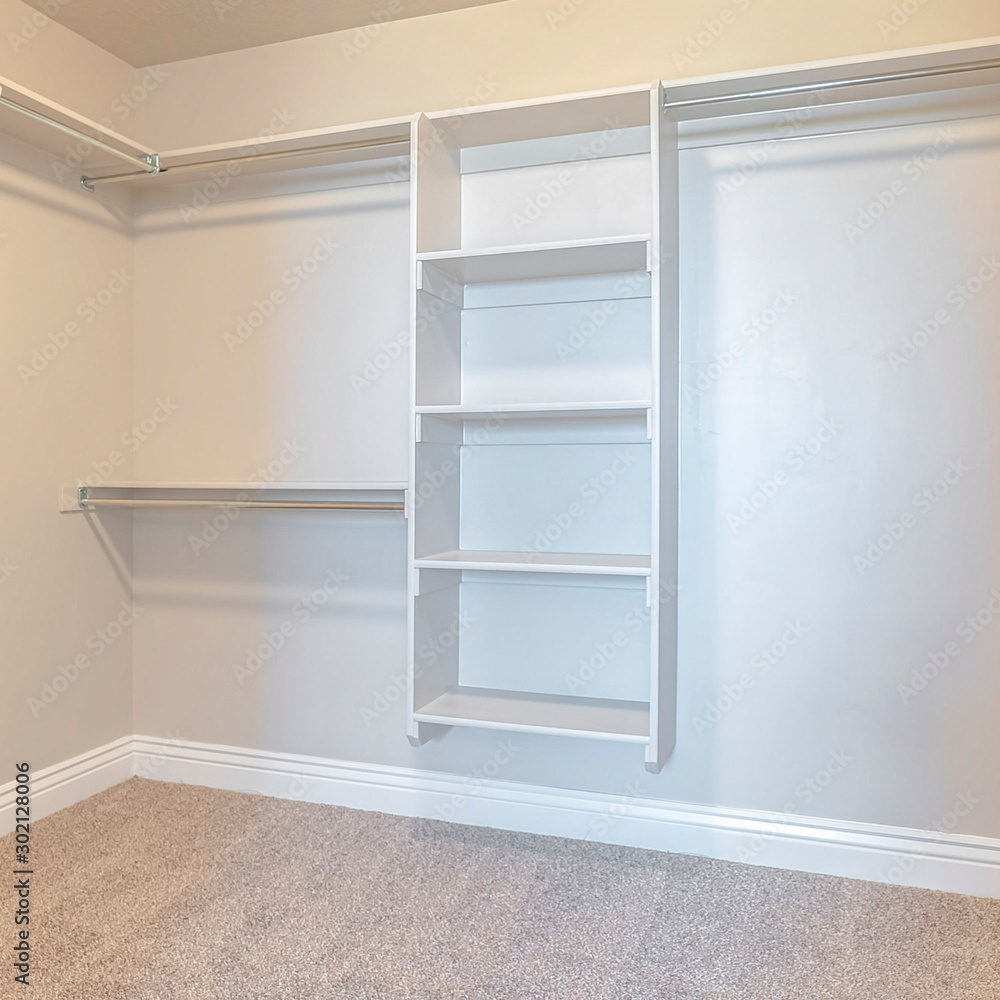 Square Empty white walk in closet with bare shelving Stock Photo ...