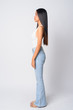© Ranta Images - Full body shot profile view of young beautiful Asian woman