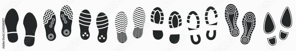 Big set of Footprints silhouette isolated on white. Vector illustration - obrazy, fototapety, plakaty 