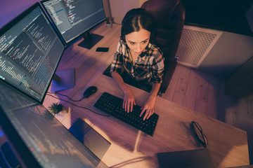 High top above angle view photo of serious developer interested in improving software using artificial intelligence