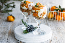 Citrus Trifle With Fresh Tangerines. Christmas Portioned Dessert On The Festive Table.