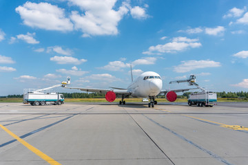 De-icing aircraft in airport