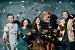© GVS - Happy young people dancing and having fun with confetti flying everywhere