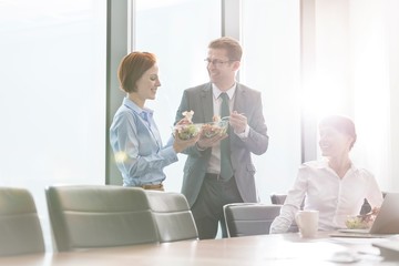 Wall Mural - Business poeple eating lunch together during break in office