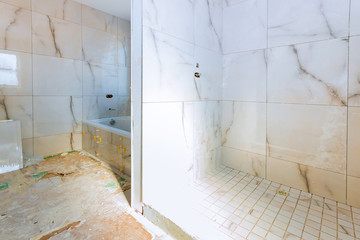 Construction remodeling a bathroom installation on interior tile finish