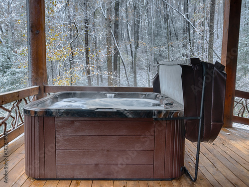 Outdoor Hot Tub On A Cabin Deck In The Winter Buy This Stock