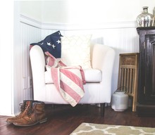 American Flag Over Chair With Boots