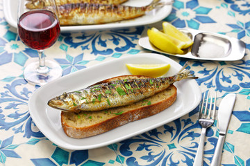 Wall Mural - sardinas assadas, portuguese grilled sardines on toasted bread