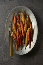 Overhead View Of Baked Carrots Served On Plate