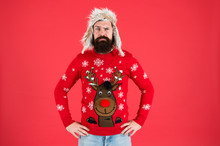 Buy Festive Clothing. Sweater With Deer. Hipster Bearded Man Wear Winter Sweater And Hat. Happy New Year. Join Holiday Party Craze And Host Ugly Christmas Sweater Party. Winter Party Outfit