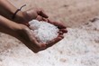 Salt in hands in a salt flats
