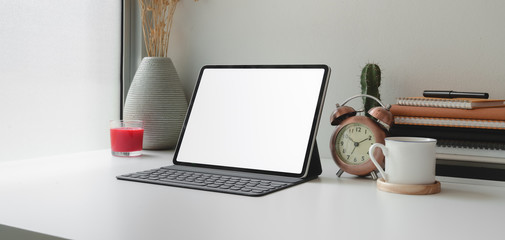 Wall Mural - contemporary workplace with blank screen digital tablet and office supplies