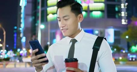 Canvas Print - businessman use phone outdoor