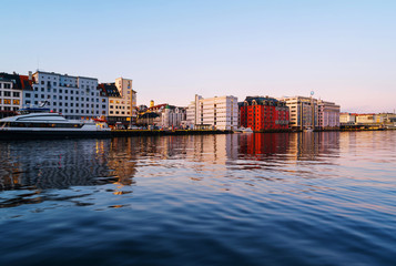 Wall Mural - View of harbour modern buildings in Bergen, Norway during the sunrise