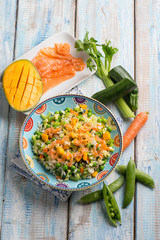 Canvas Print - rice salad with smoked salmon mango and mixed vegetables