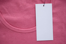 Blank White Clothes Tag Label On New Shirt