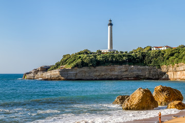 Wall Mural - Biarritz Lighthouse (Faro de Biarritz) on the cliff. Holidays on the Basque coast of France.