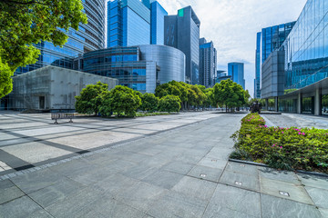 Wall Mural - modern buildings and empty pavement in china.