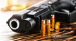 Gun with ammunition on dark stone background. Guns ammo or rounds military picture.