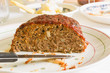 Classic American meatloaf made with ground beef oatmeal onions and a ketchup brown sugar and mustard glaze