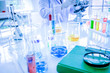 © Tadlarp - A Scientists are working in the laboratory.,A 18s students are testing in the classroom.
