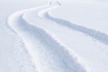 Car Tracks In The Deep Fresh Snow
