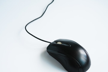 Modern black computer mouse on white background