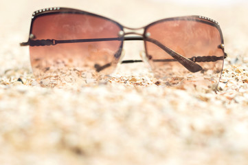 sunglasses on wooden table