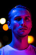© stockme - Modern red and blue light portrait of a young man