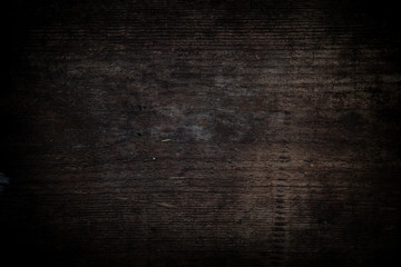 Empty dark wood background to insert. space for text.