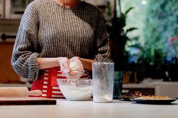 Wall Mural - woman preparing dough for dumplings