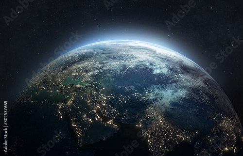 Cuadros en Lienzo Nightly planet Earth in dark outer space