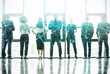© alphaspirit - Network background concept with business people silhouette. Double exposure and network effects