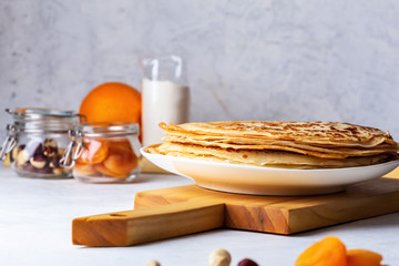 Wall Mural - Thin pancakes, ingredients, making blini crepes