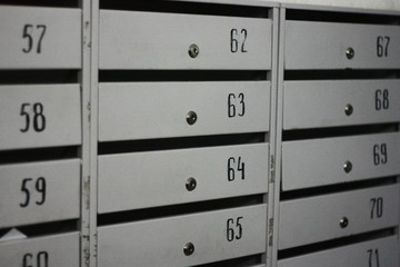 Wall Mural - Mailboxes with numbers on the floor view 