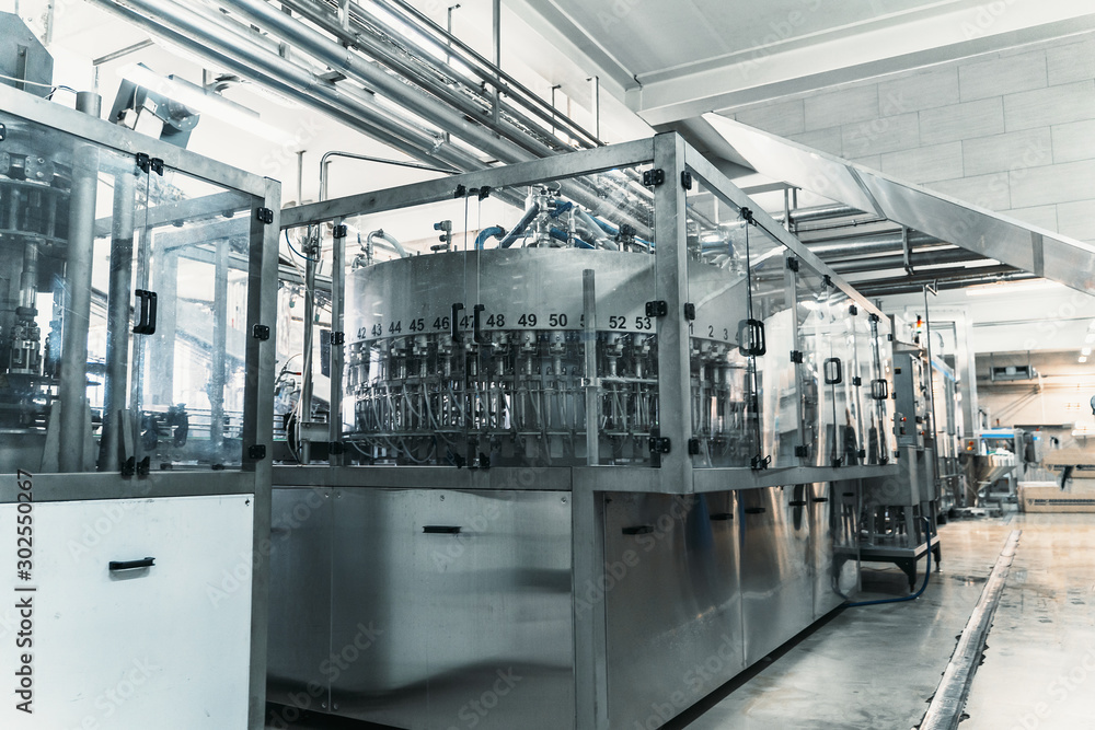 Industrial machine in beverage plant or factory interior, industry equipment, toned - obrazy, fototapety, plakaty 