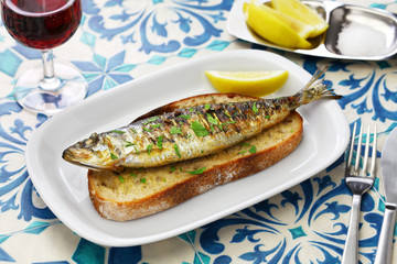 Wall Mural - sardinhas assadas, portuguese grilled sardine on toasted bread