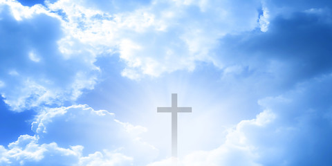 Wall Mural - christian cross appeared bright in the sky with soft fluffy clouds, white, beautiful colors. with th
