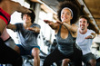 © NDABCREATIVITY - Beautiful fit people exercising together in gym