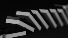 Domino Effect. Row Of White And Black Dominoes Falling Down. Chain Reaction. The Domino Principle. Falling Dominoes. 