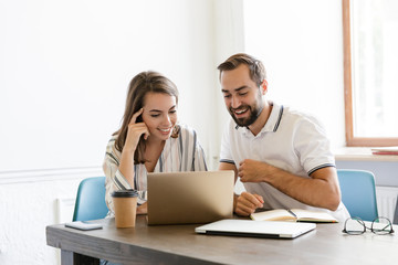 Sticker - Positive pleased couple colleagues talking with each other.