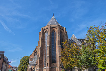 Wall Mural - Details of XV Nieuwe Kerk (New Church, 1396 - 1496) on central Market square in Delft, Holland. New Church, with 108,5 m church tower - second highest church in the Netherlands.