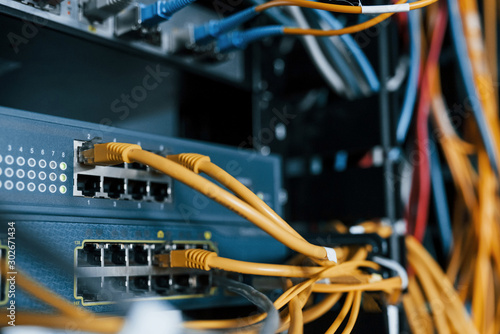 Fotografía Close up view of internet equipment and cables in the server room