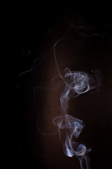 Smoke motion on black background.