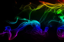 Beautiful Colorful Smoke Abstract On Black Background, Moving Of Fire Design