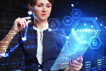 Business, Technology, Internet and network concept. Young businessman working on a virtual screen of the future and sees the inscription: Payroll